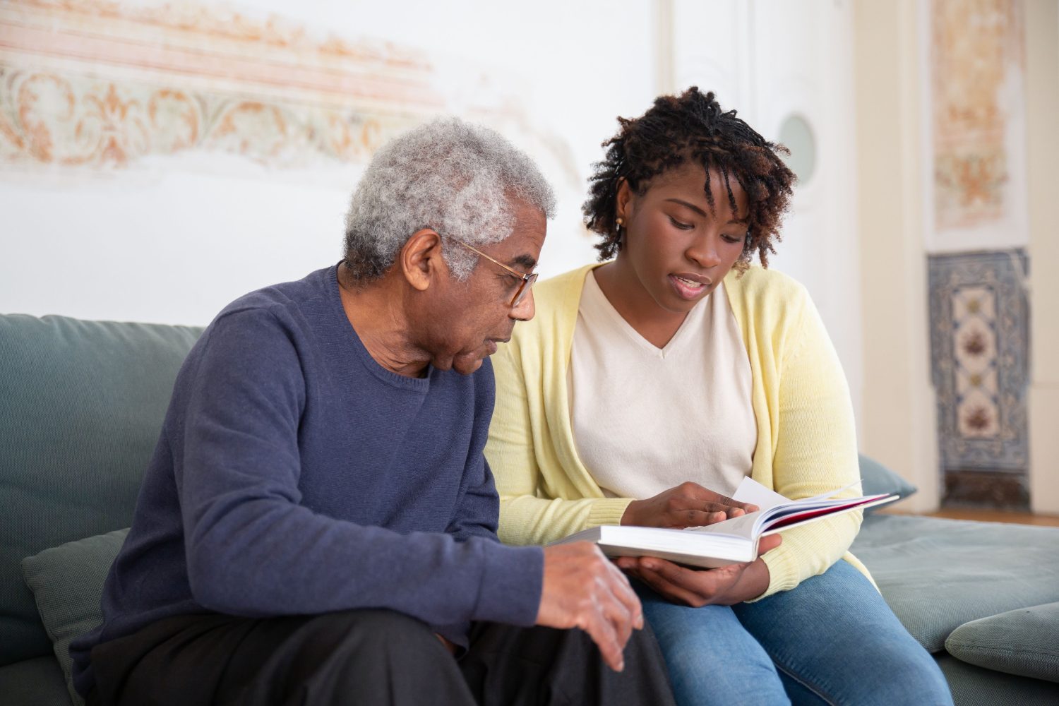 A caregiver spending time with a client at home